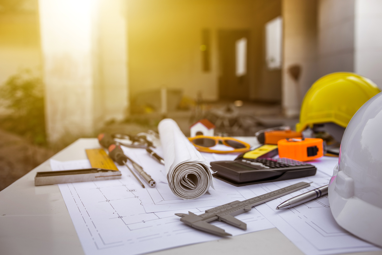 Table with Plans and Construction Tools